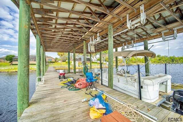 dock area featuring a water view