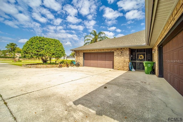 exterior space with a garage