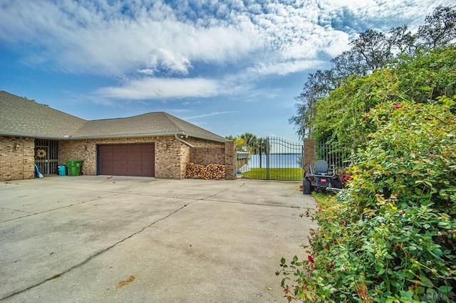 view of side of property featuring a garage