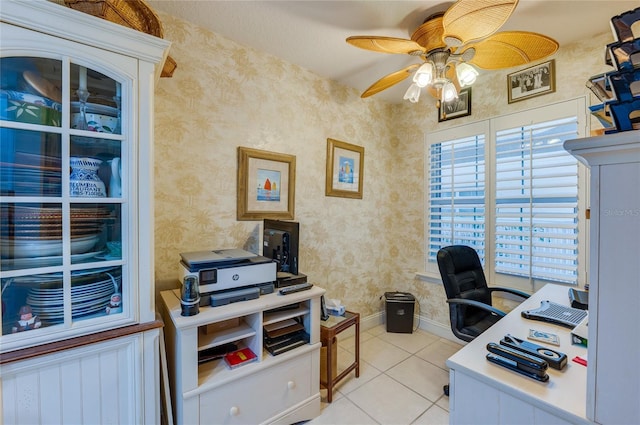 office featuring ceiling fan and light tile floors