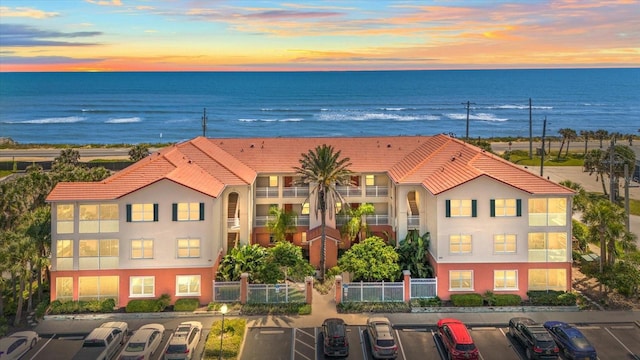 exterior space with a water view