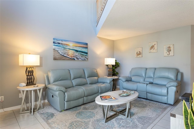 tiled living room with a textured ceiling