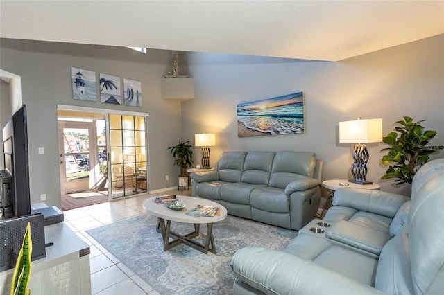 tiled living room featuring vaulted ceiling