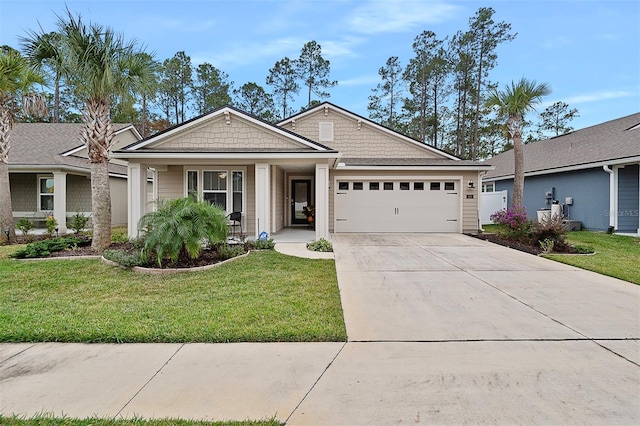 view of front of property with a front lawn and a garage