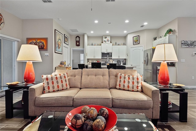 living room featuring tile patterned floors