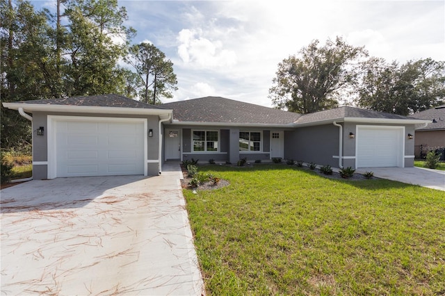 ranch-style house featuring a garage and a front lawn