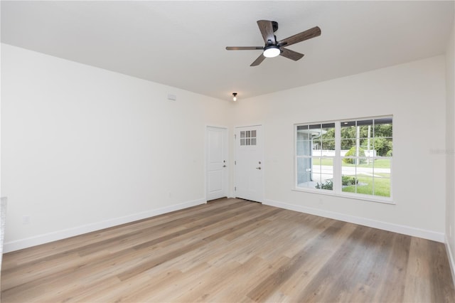 unfurnished room featuring ceiling fan and light hardwood / wood-style flooring