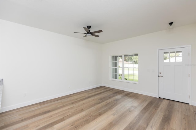 entryway with ceiling fan and light hardwood / wood-style flooring