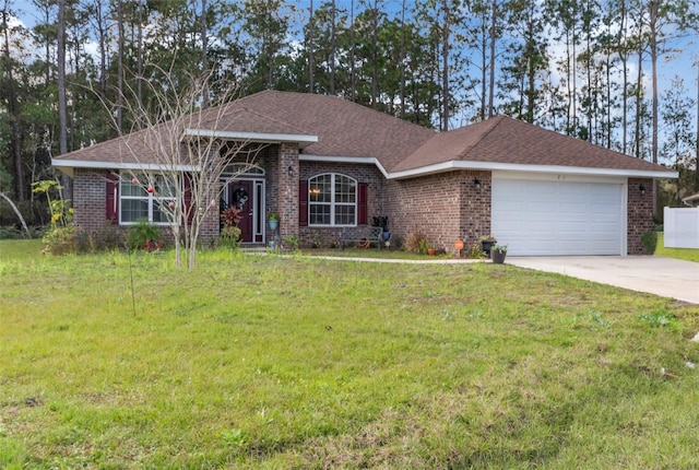 ranch-style home with a front yard and a garage