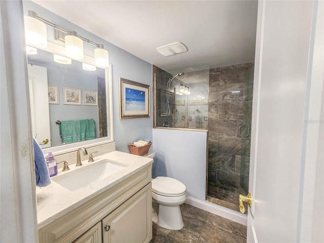 bathroom featuring an enclosed shower, tile flooring, large vanity, and toilet