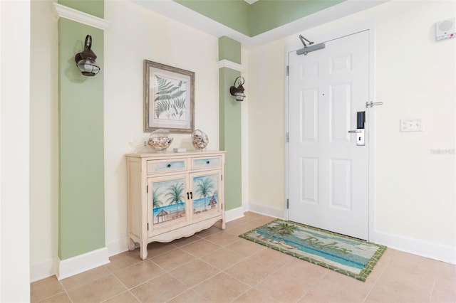 entrance foyer featuring tile patterned flooring