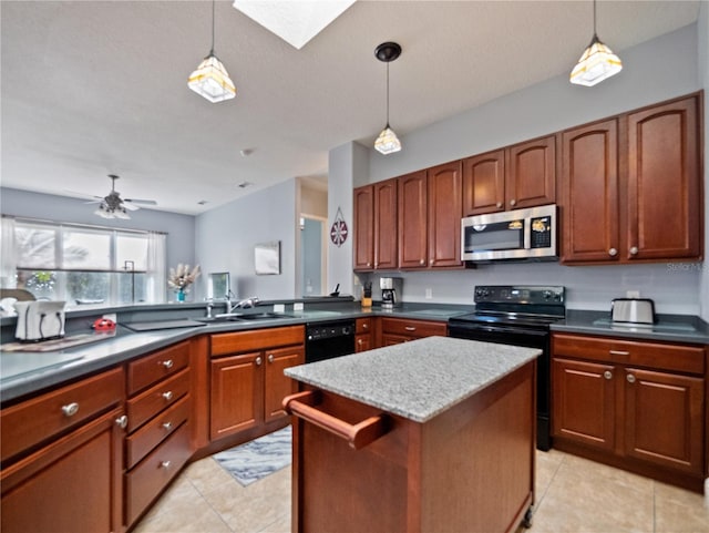 kitchen featuring pendant lighting, light tile flooring, ceiling fan, and black appliances