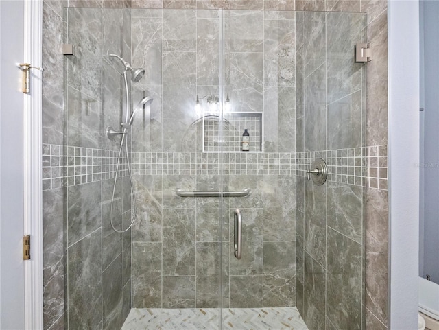 full bath featuring a shower stall