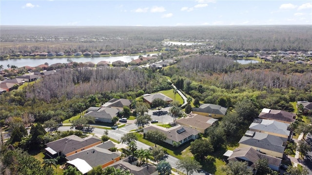 birds eye view of property featuring a residential view and a water view