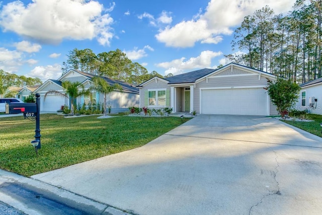 ranch-style house with a front yard and a garage