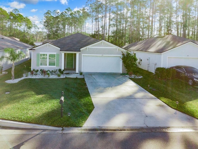 single story home featuring a front lawn and a garage