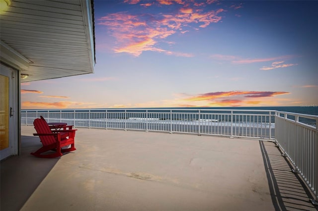 view of patio terrace at dusk