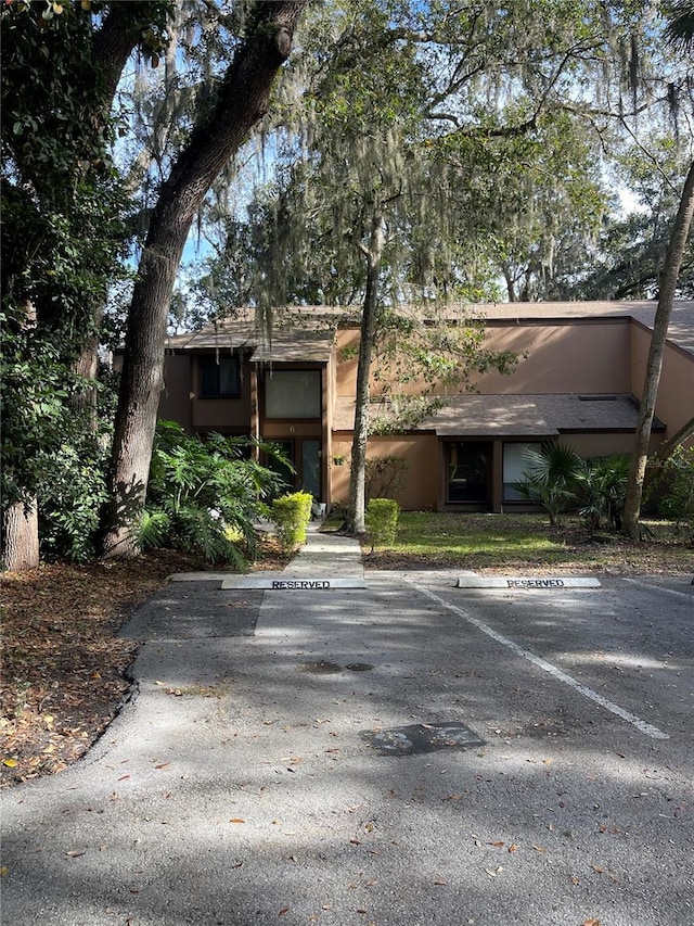 view of front of property with uncovered parking