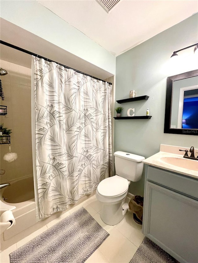 bathroom with shower / tub combo, visible vents, toilet, tile patterned floors, and vanity