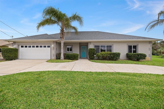 ranch-style home featuring a front yard and a garage