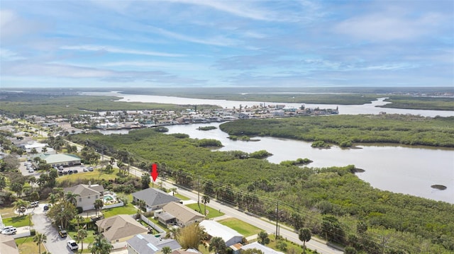 drone / aerial view with a water view