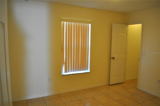 view of tiled spare room