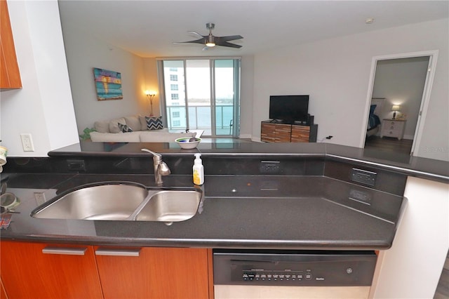 kitchen with dishwashing machine, ceiling fan, and sink