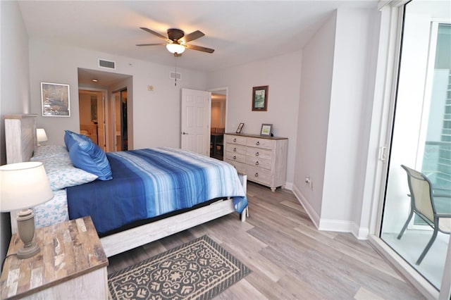 bedroom featuring ceiling fan and light hardwood / wood-style flooring