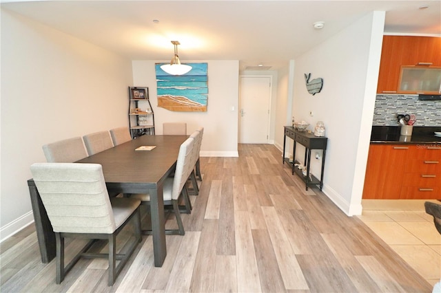 dining space featuring light hardwood / wood-style floors