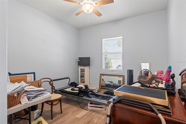 interior space featuring ceiling fan and hardwood / wood-style flooring