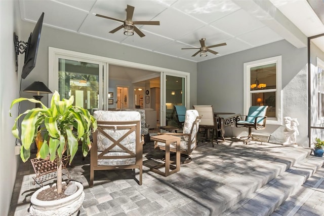 view of terrace featuring ceiling fan