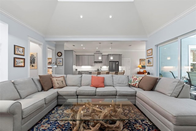 living room featuring lofted ceiling and ornamental molding