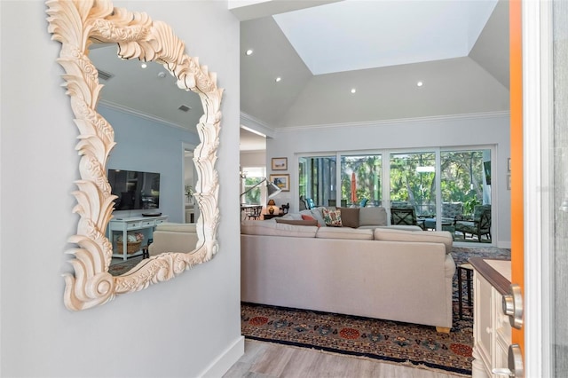 living room featuring high vaulted ceiling, crown molding, and light hardwood / wood-style flooring