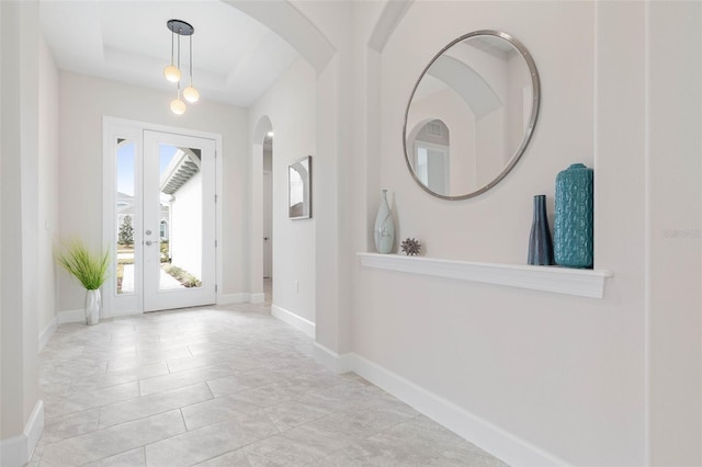 tiled entryway with french doors