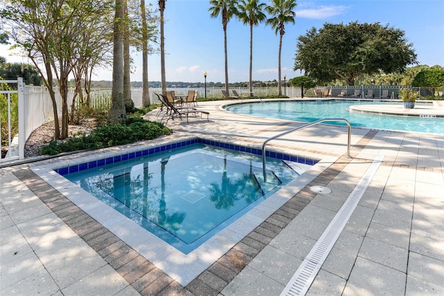 view of pool featuring a patio area