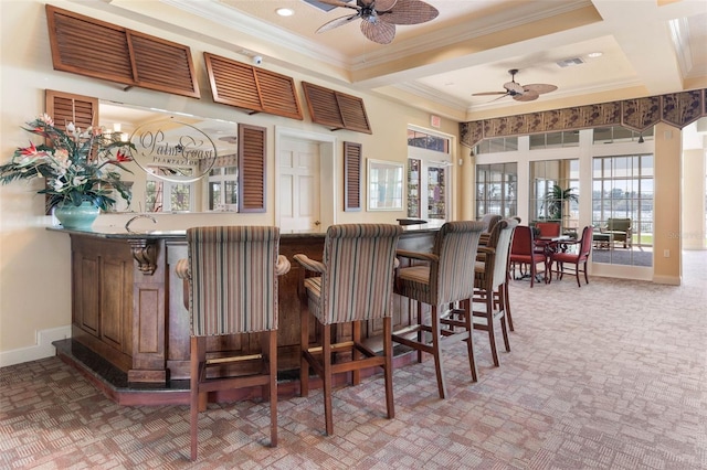 bar featuring carpet flooring, coffered ceiling, ceiling fan, and ornamental molding