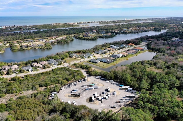 drone / aerial view featuring a water view