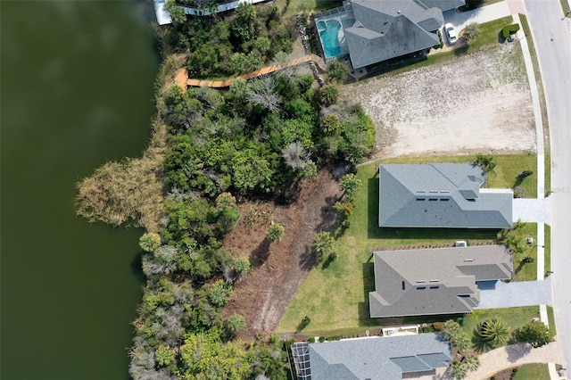 drone / aerial view featuring a water view