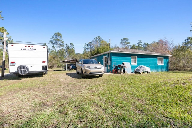 exterior space featuring a carport