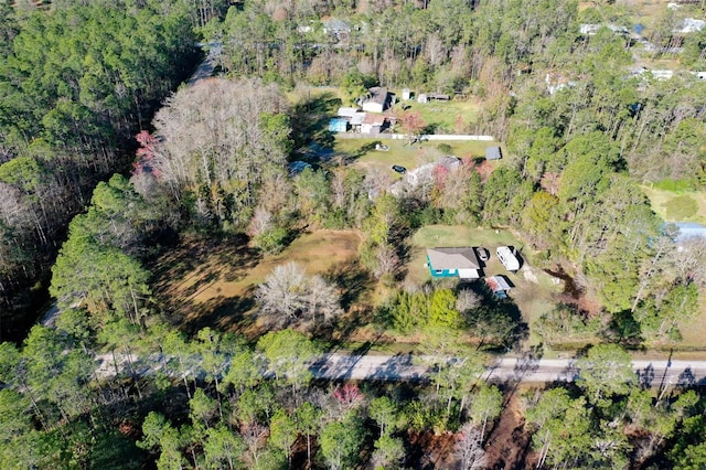 bird's eye view featuring a view of trees