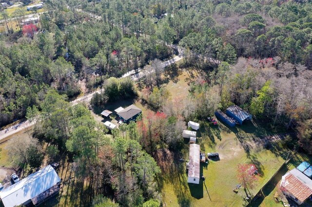 aerial view with a wooded view