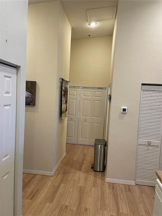 hallway featuring light hardwood / wood-style floors