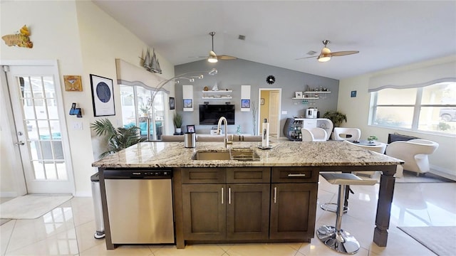 kitchen with lofted ceiling, ceiling fan, dishwasher, and sink