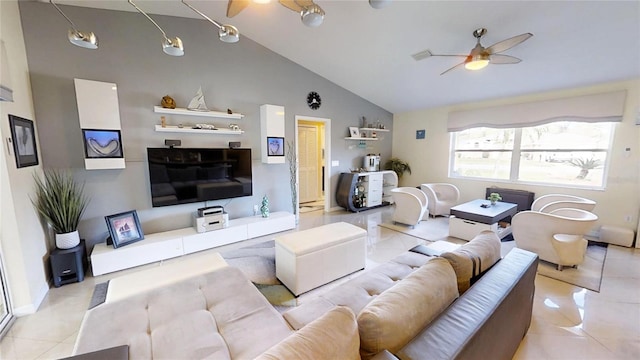 living room with light tile floors, vaulted ceiling, and ceiling fan