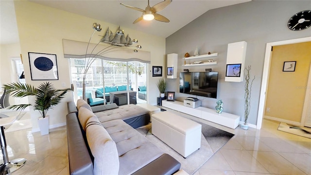 tiled living room with vaulted ceiling and ceiling fan