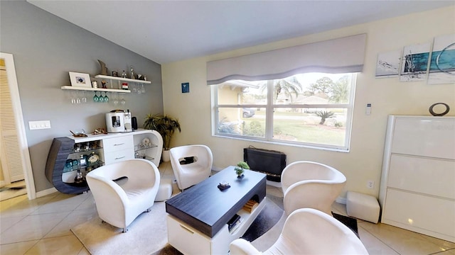 dining room with light tile floors