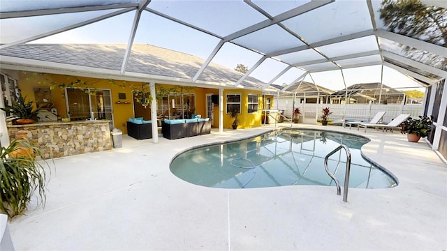 view of pool with an outdoor hangout area, a patio, and a lanai