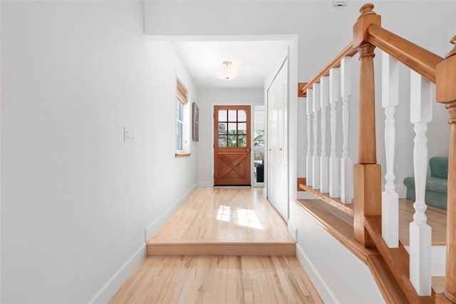 entryway with light hardwood / wood-style flooring