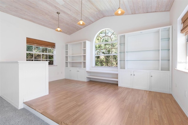 unfurnished room with wood ceiling, lofted ceiling, and light wood-type flooring