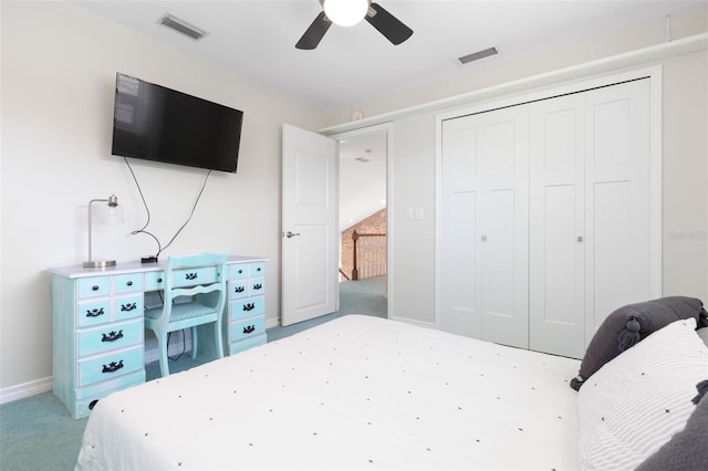 bedroom with light carpet, a closet, and ceiling fan